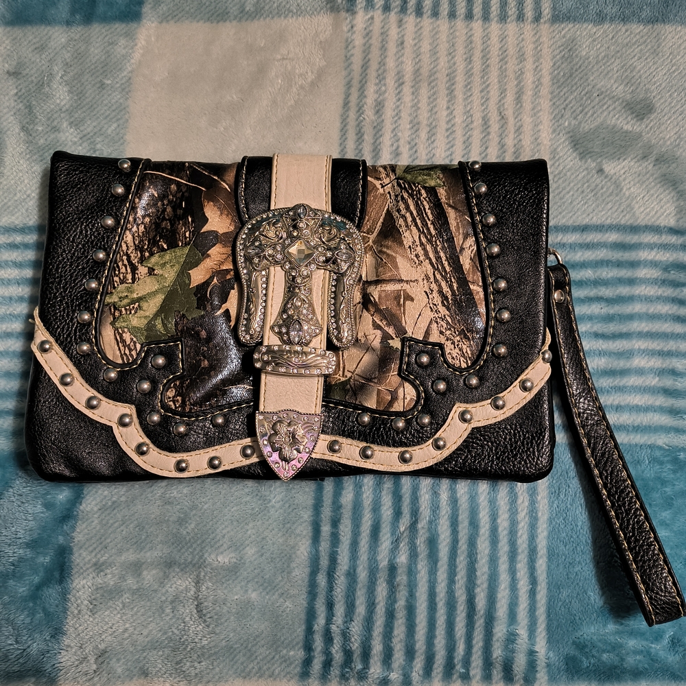 Black and Tan Clutch with Ornate Buckle and Studded Details